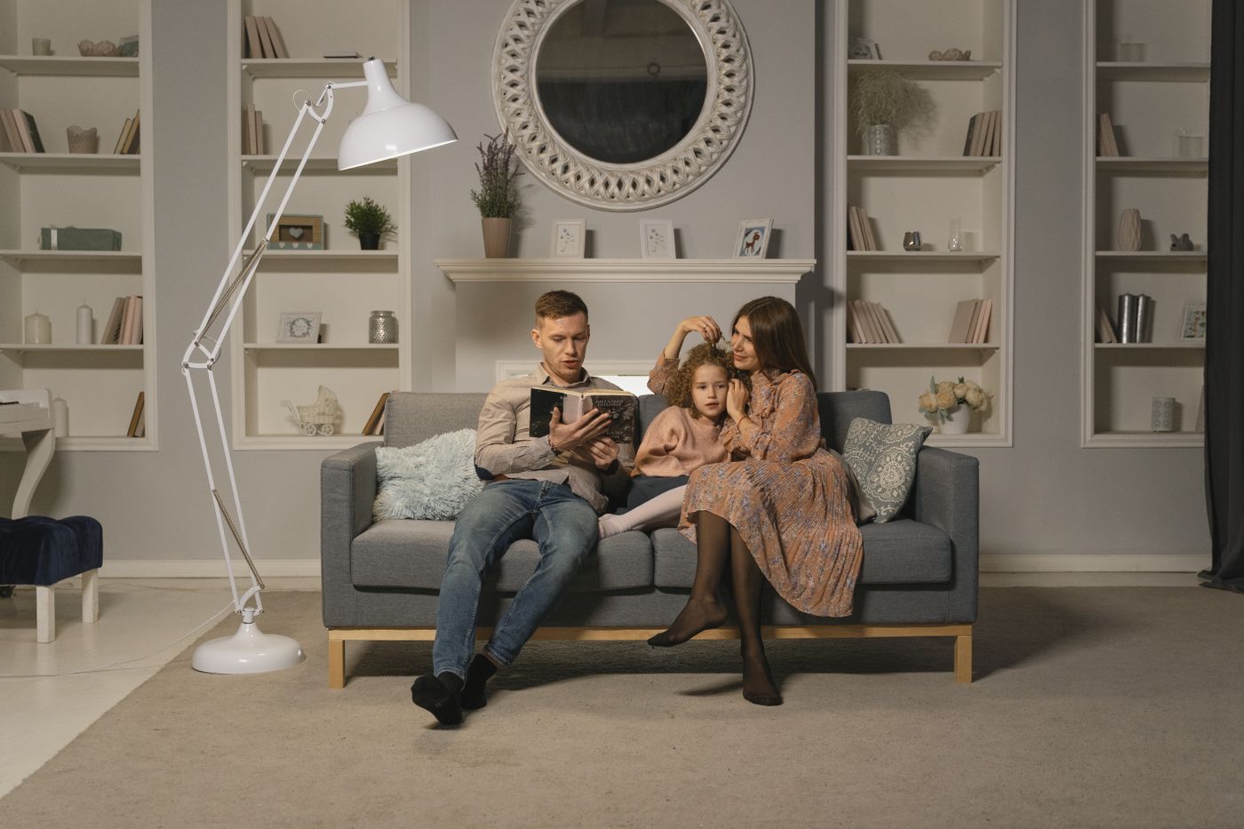 A family reading together in their living room